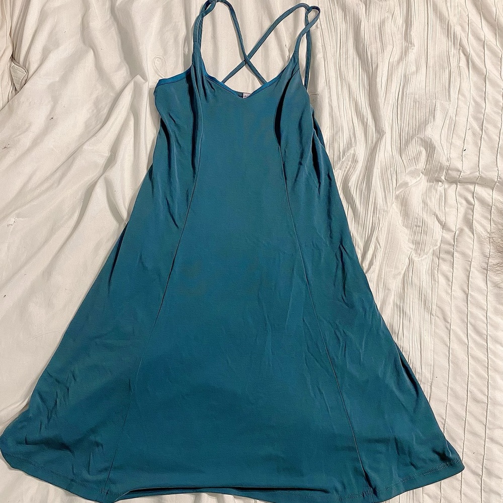 Teal swing dress with criss cross back